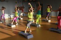 Marina Paraluppi teaching Zumba Step in the gym