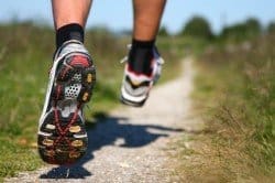 A man running down a trail