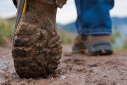 Walking down a muddy trail