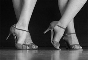 Women wearing high heeled latin dance shoes