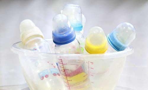 baby bottles in water