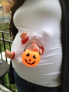 baby pregnant woman halloween costume, white with orange bin
